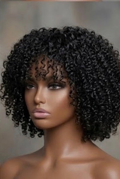 Short curly black afro wig with tight curls and bangs for women. 